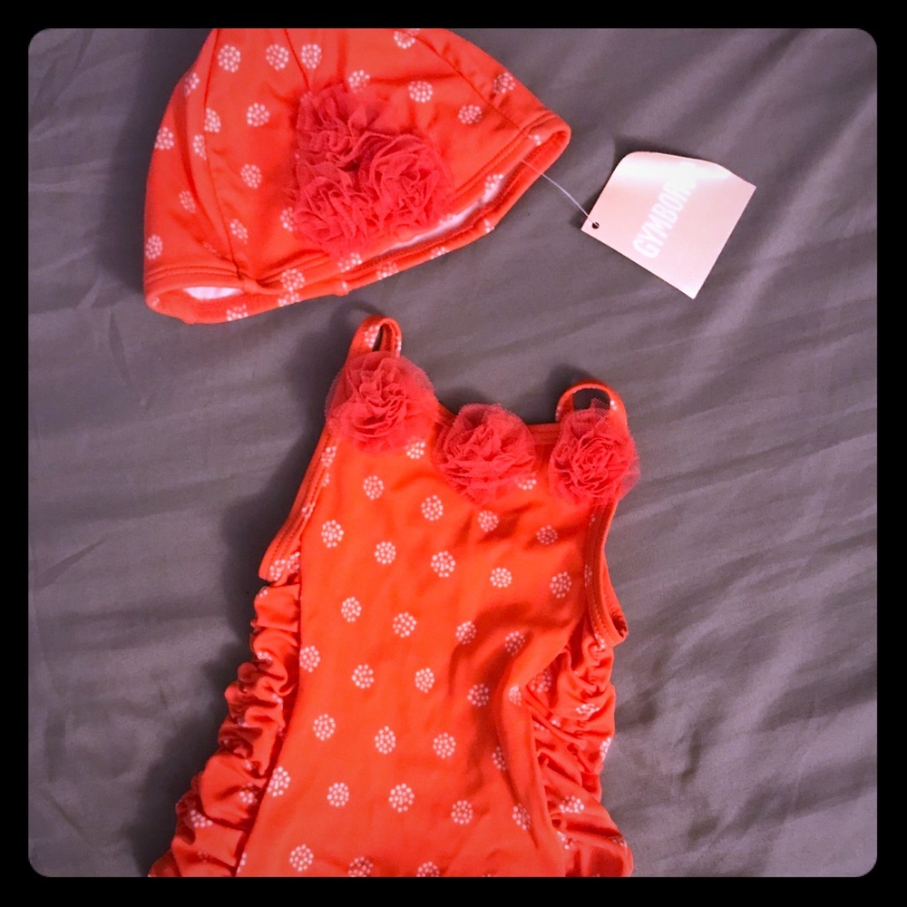 Infant swimsuit with cap